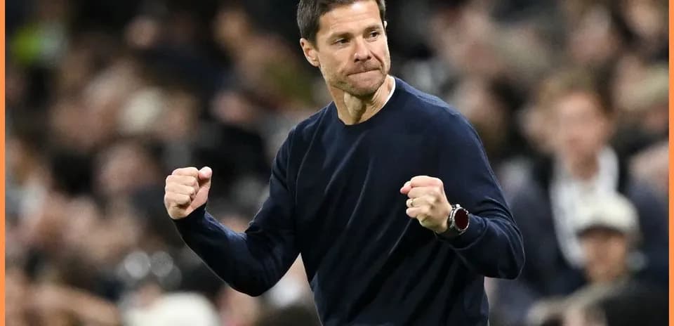 Coach celebrating a goal with clenched fists