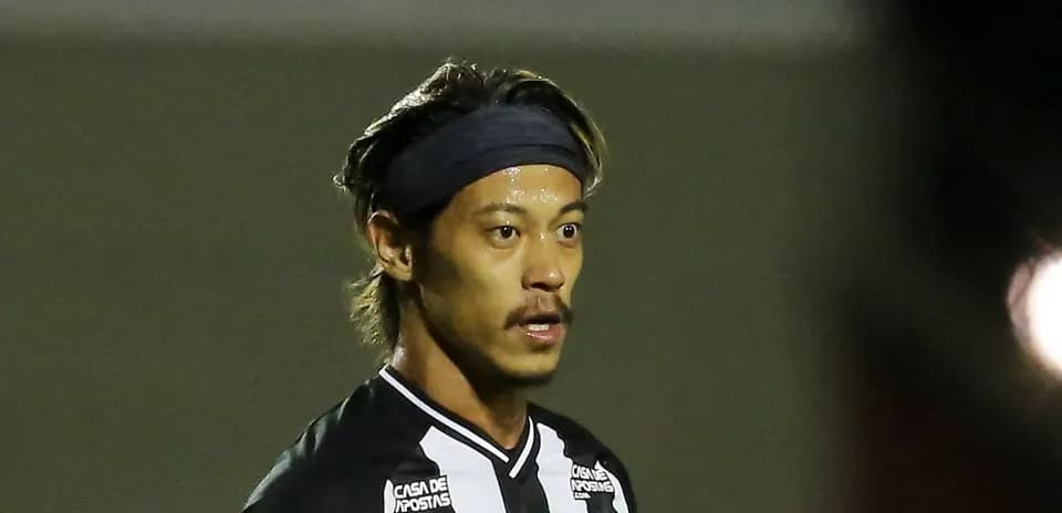 Player in black and white jersey during match