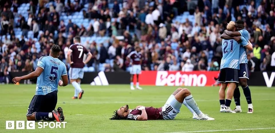 Players reacting after a match on the pitch