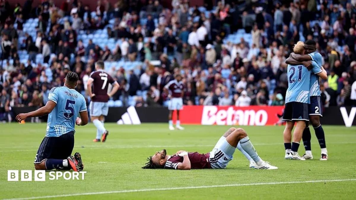 Players reacting after a match on the pitch