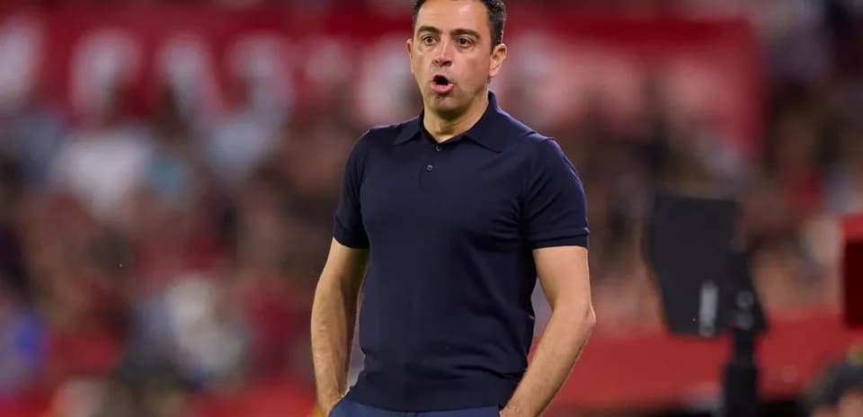 Coach giving instructions during a football match