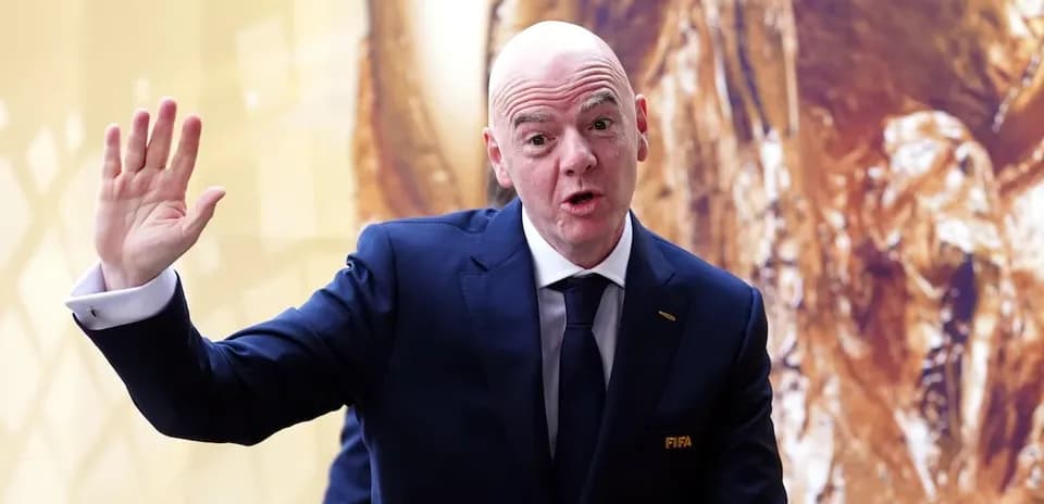 FIFA official waving during event presentation