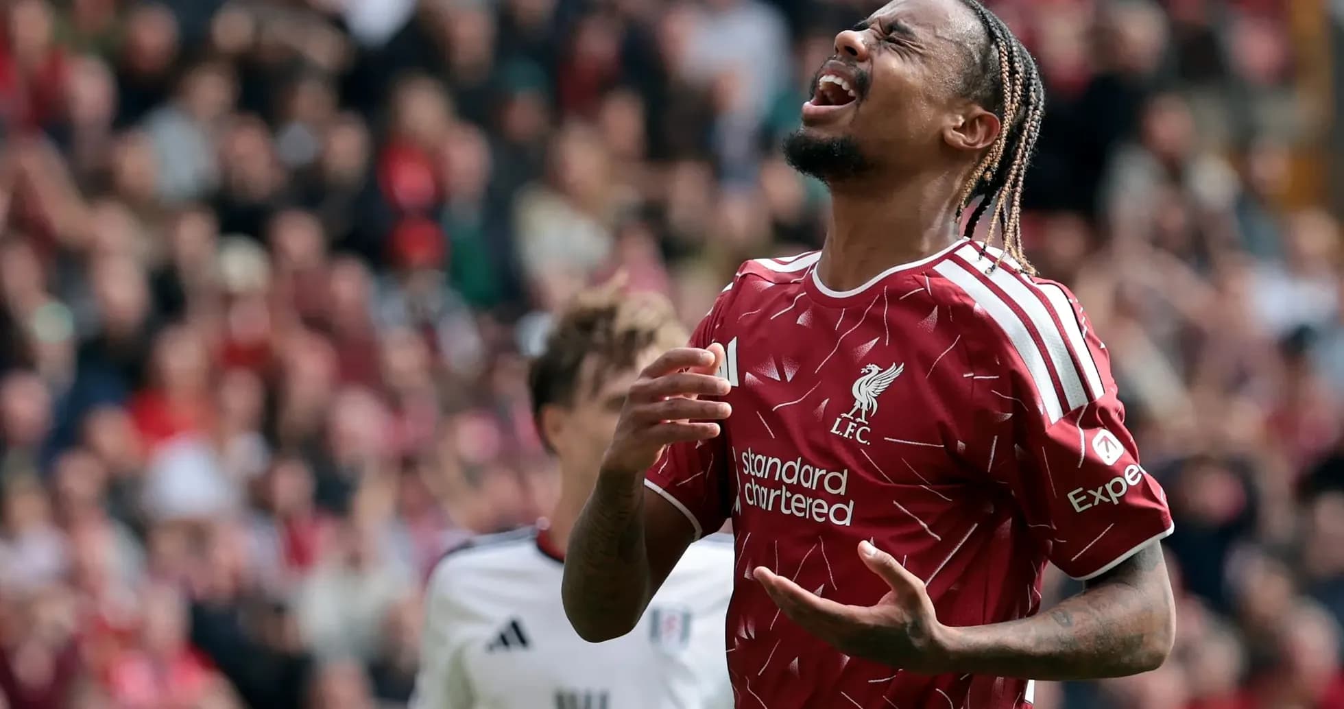 Liverpool player expressing frustration during match