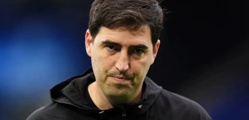 Coach looking thoughtful during match preparation