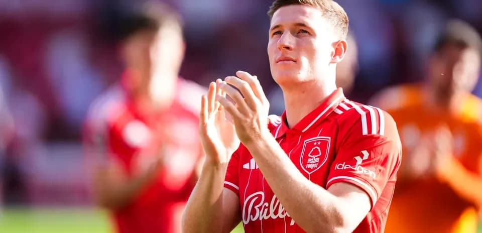 Player applauding fans during match celebration