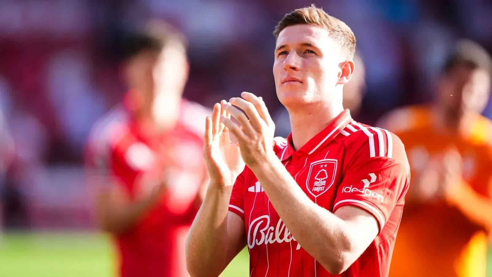 Player applauding fans during match celebration