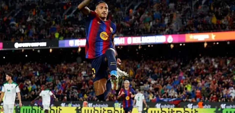 Player celebrating a goal during match at Camp Nou