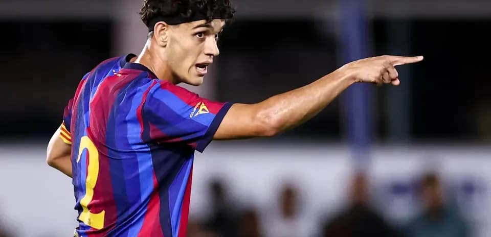 Player gesturing during a match in Barcelona jersey