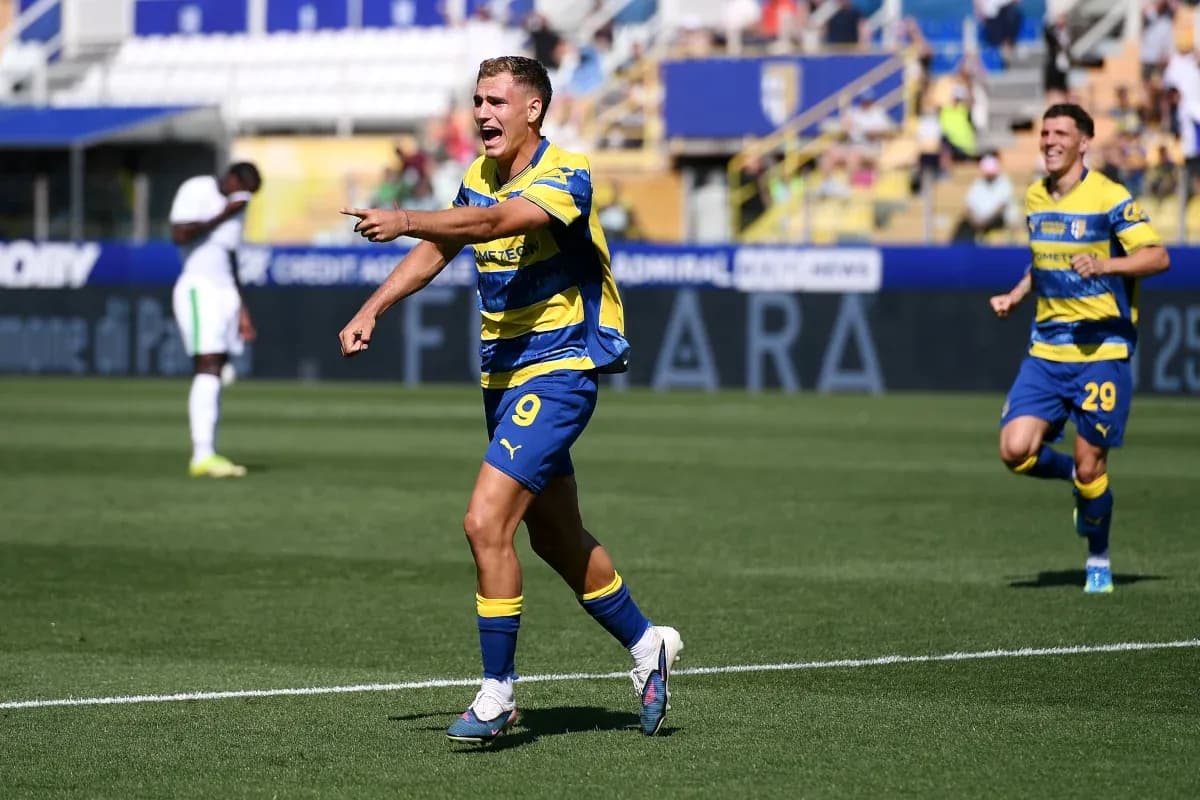 Parma players celebrating during a Serie A match