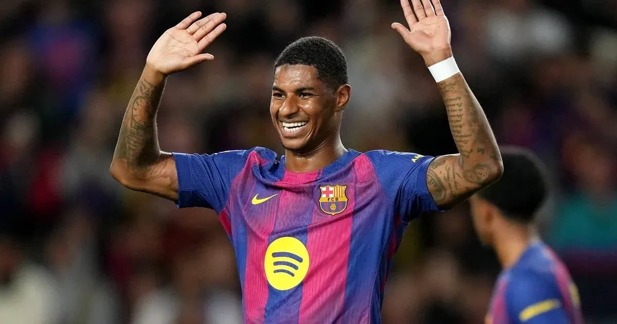 Player celebrating with hands raised during match