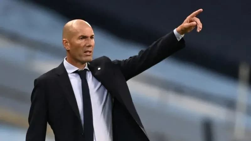 Coach gesturing during a match on the sideline
