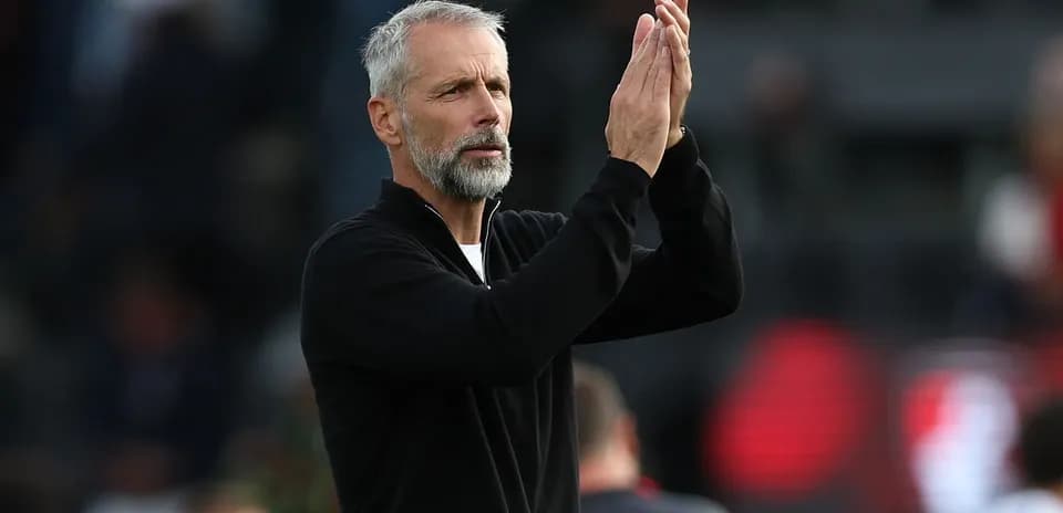 Coach applauding during a match or event