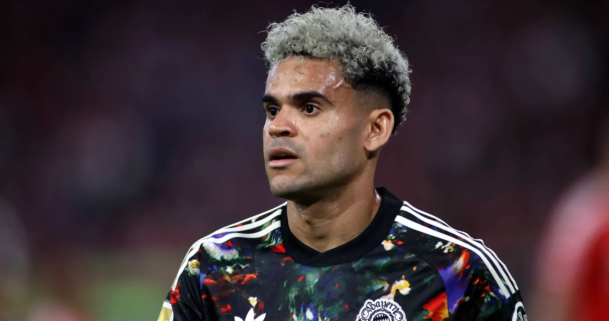 Player in colorful jersey during match action