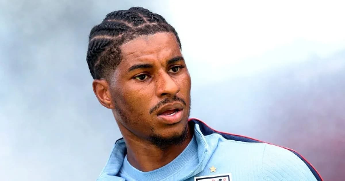 Player in training kit with braided hairstyle