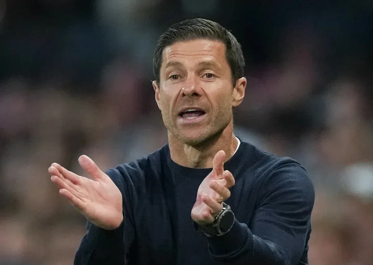 Coach gesturing during a match on the sidelines