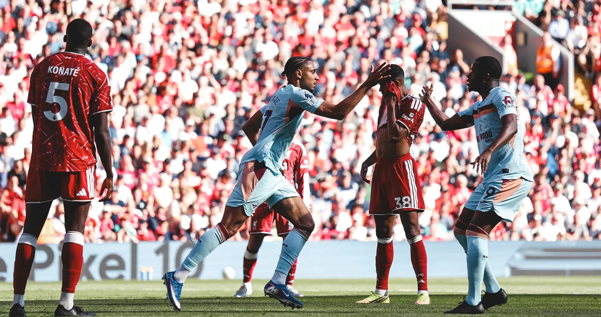 Brentford players celebrating during match against Liverpool