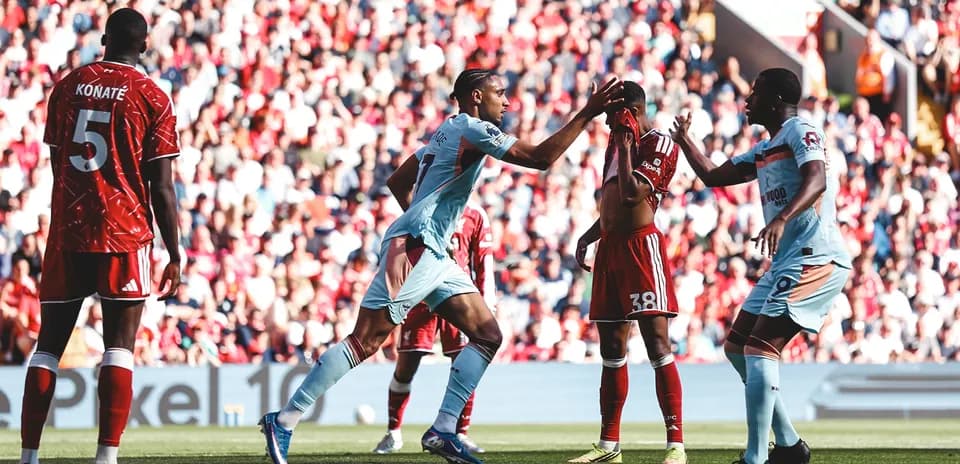 Brentford players celebrating during match against Liverpool