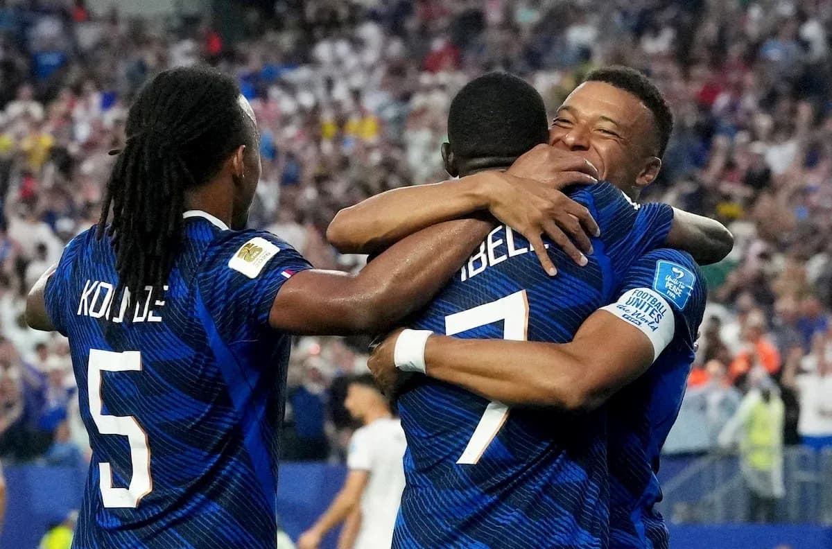 Players celebrating a goal during France match