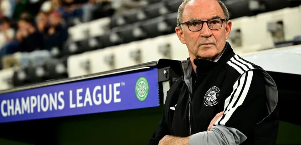 Coach observing match from the sidelines during Champions League