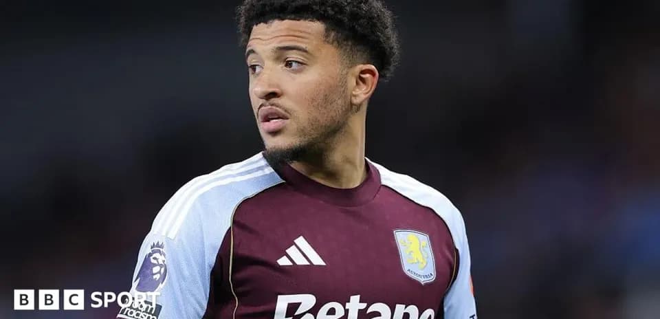 Aston Villa player looking on during match