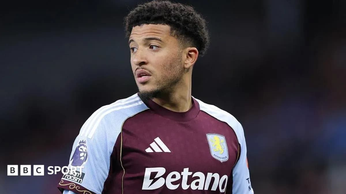 Aston Villa player looking on during match