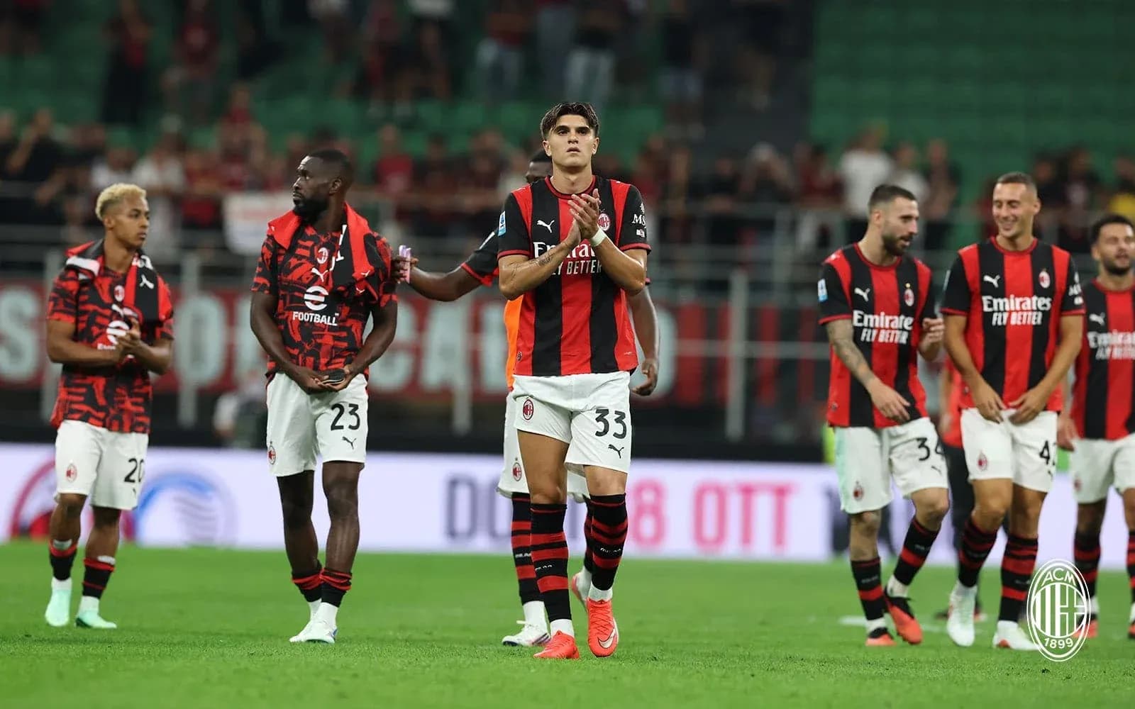 AC Milan players celebrating after a match