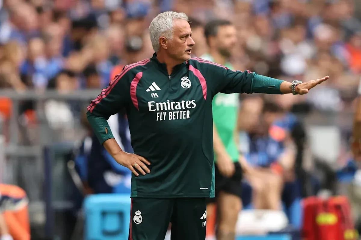 Coach directing players during a match