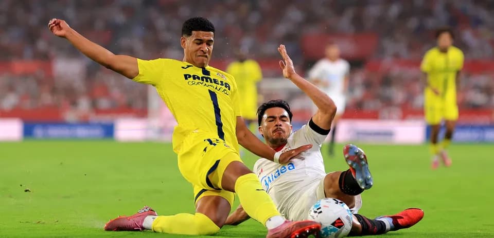 Players clashing during Villarreal vs Sevilla match