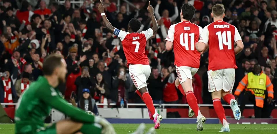 Bukayo Saka celebrating goal with teammates