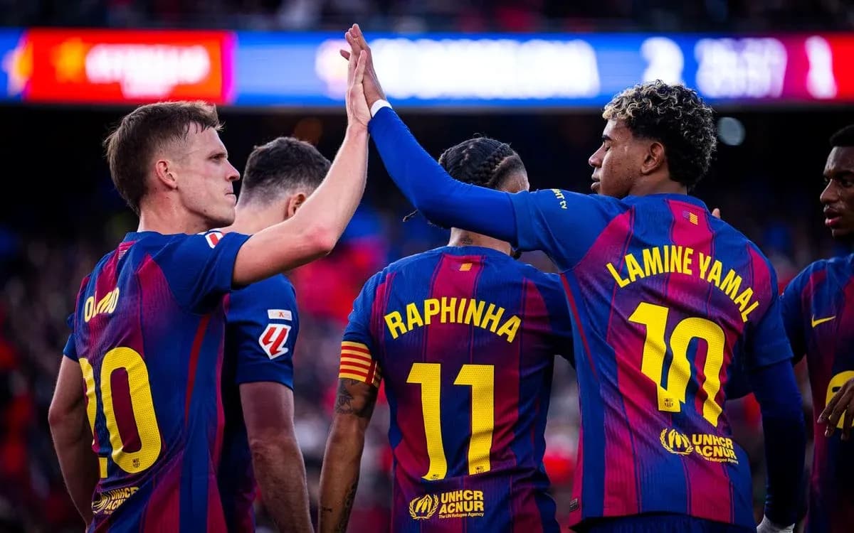 Barcelona players celebrating during La Liga match