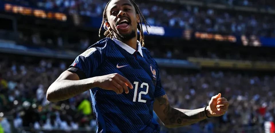 Player celebrating after scoring for France during match