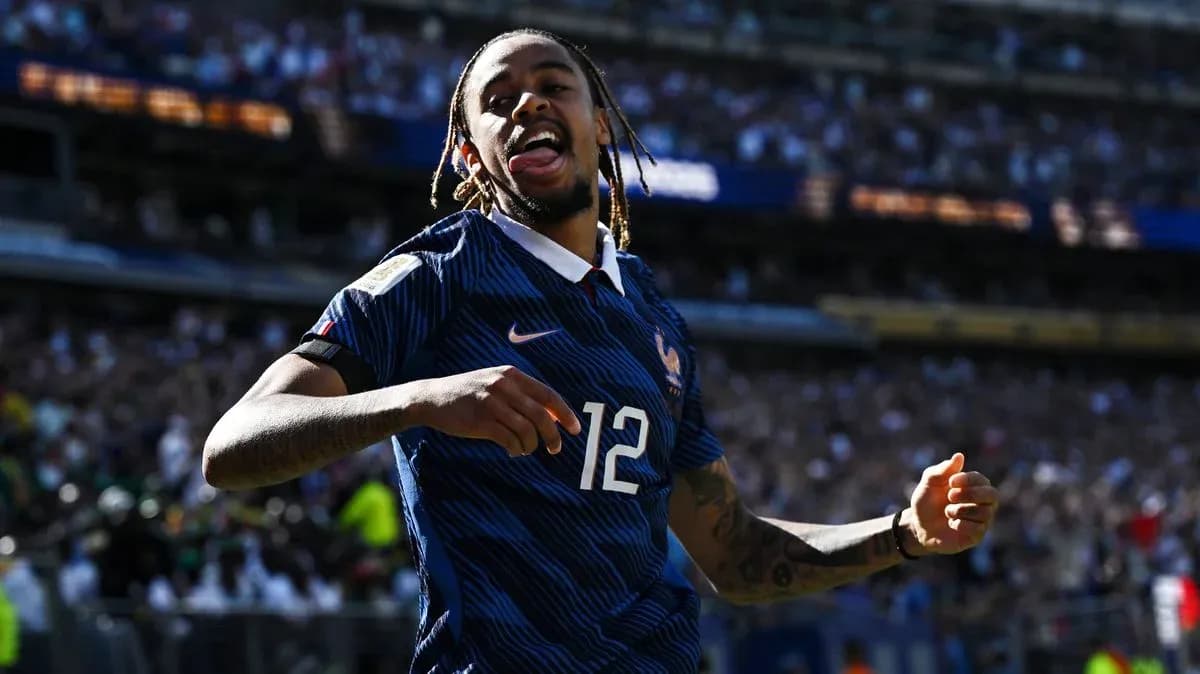 Player celebrating after scoring for France during match