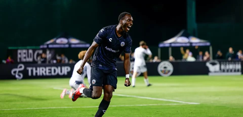 Player celebrating a goal during USL match