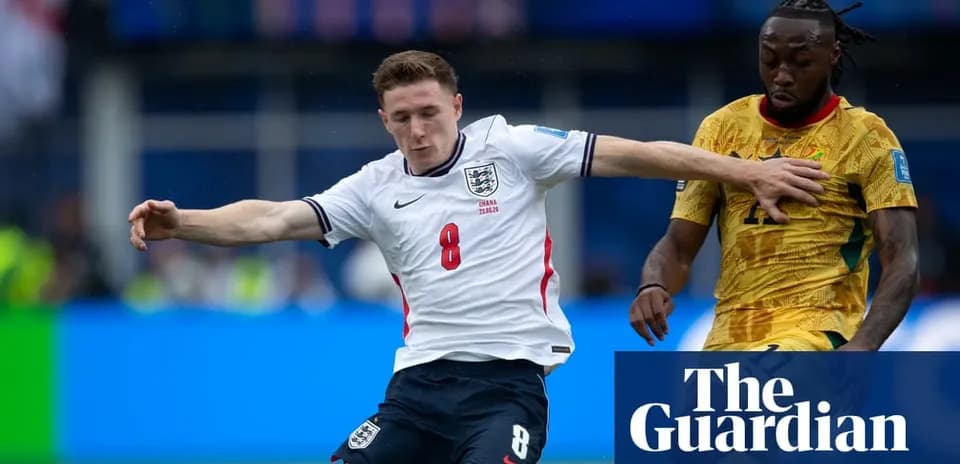 England player tackles opponent during football match