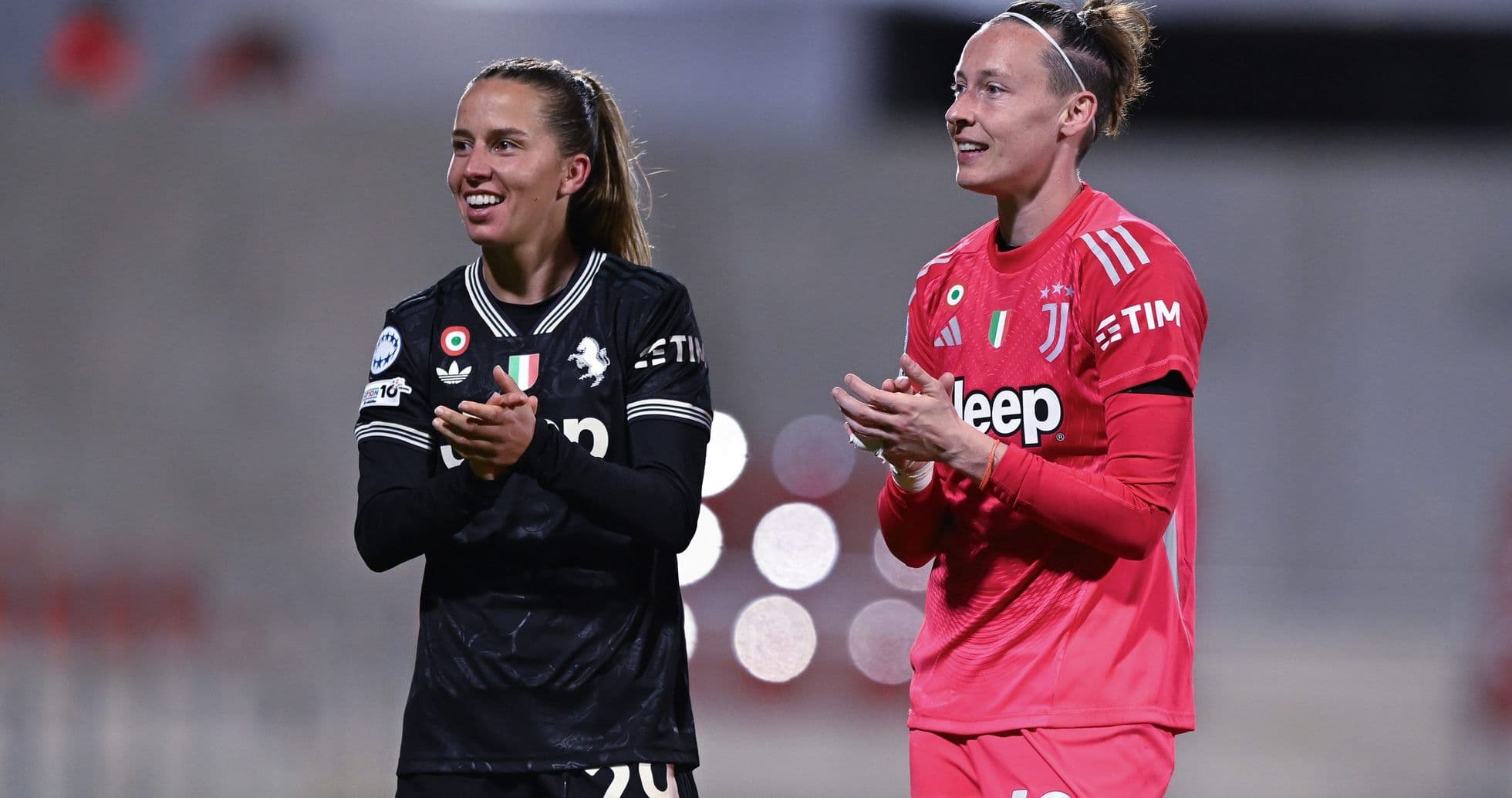 Players from Parma W and Juventus W applauding
