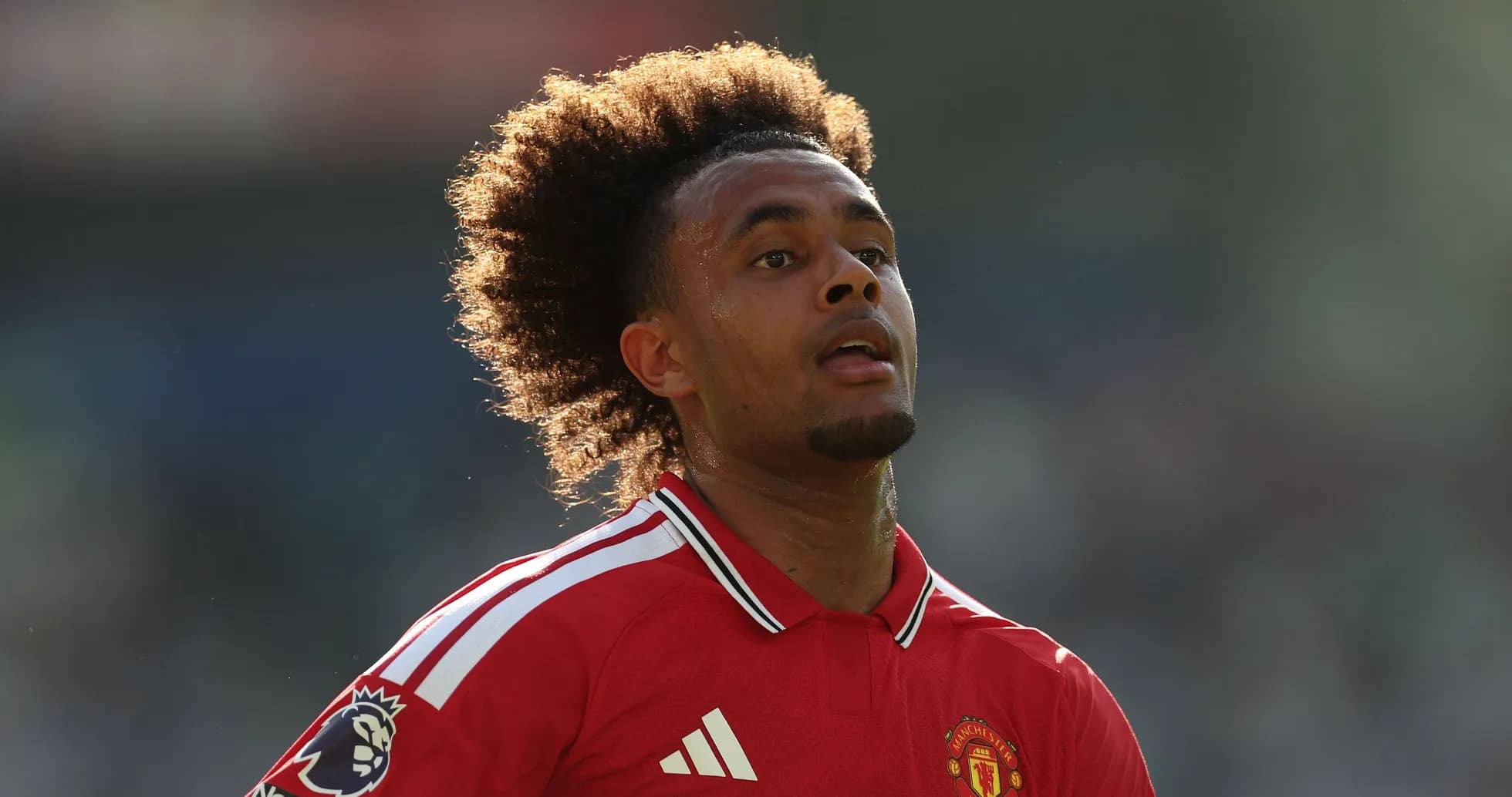 Player in red Manchester United jersey during match