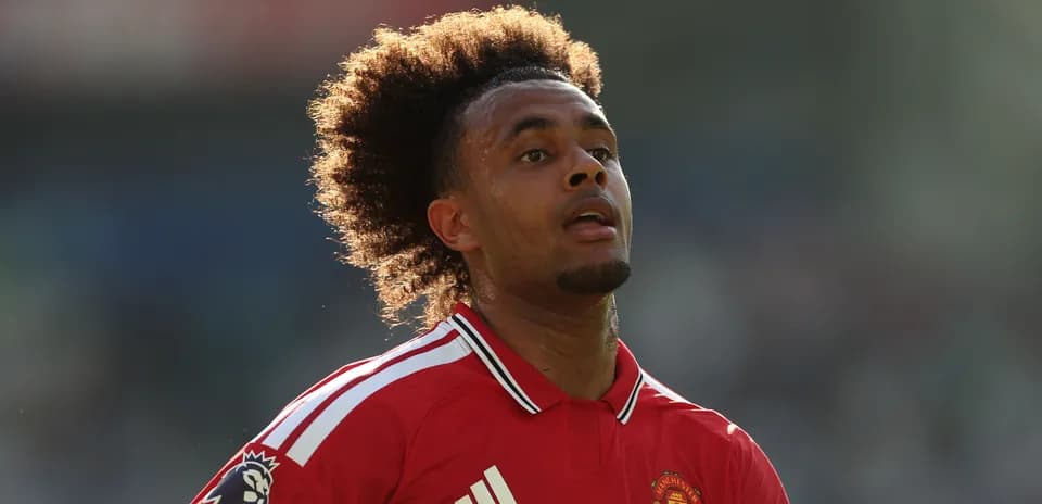 Player in red Manchester United jersey during match