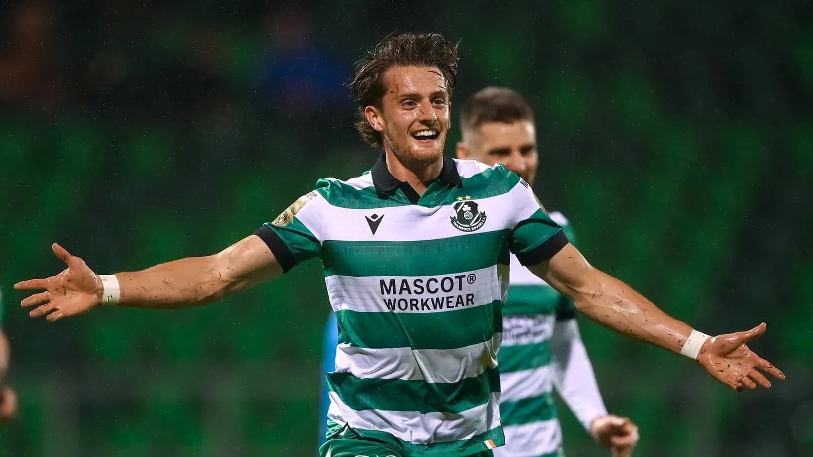 Player celebrating a goal with outstretched arms
