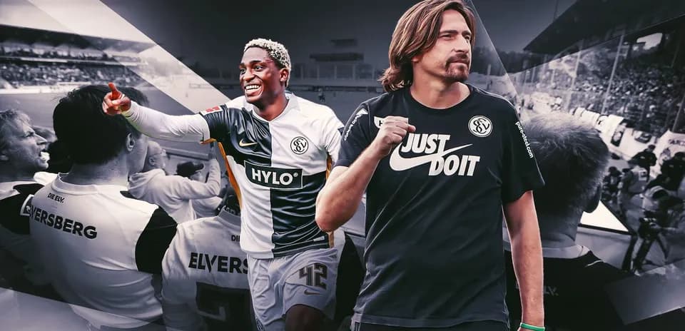 Player celebrating with fans and teammate in stadium