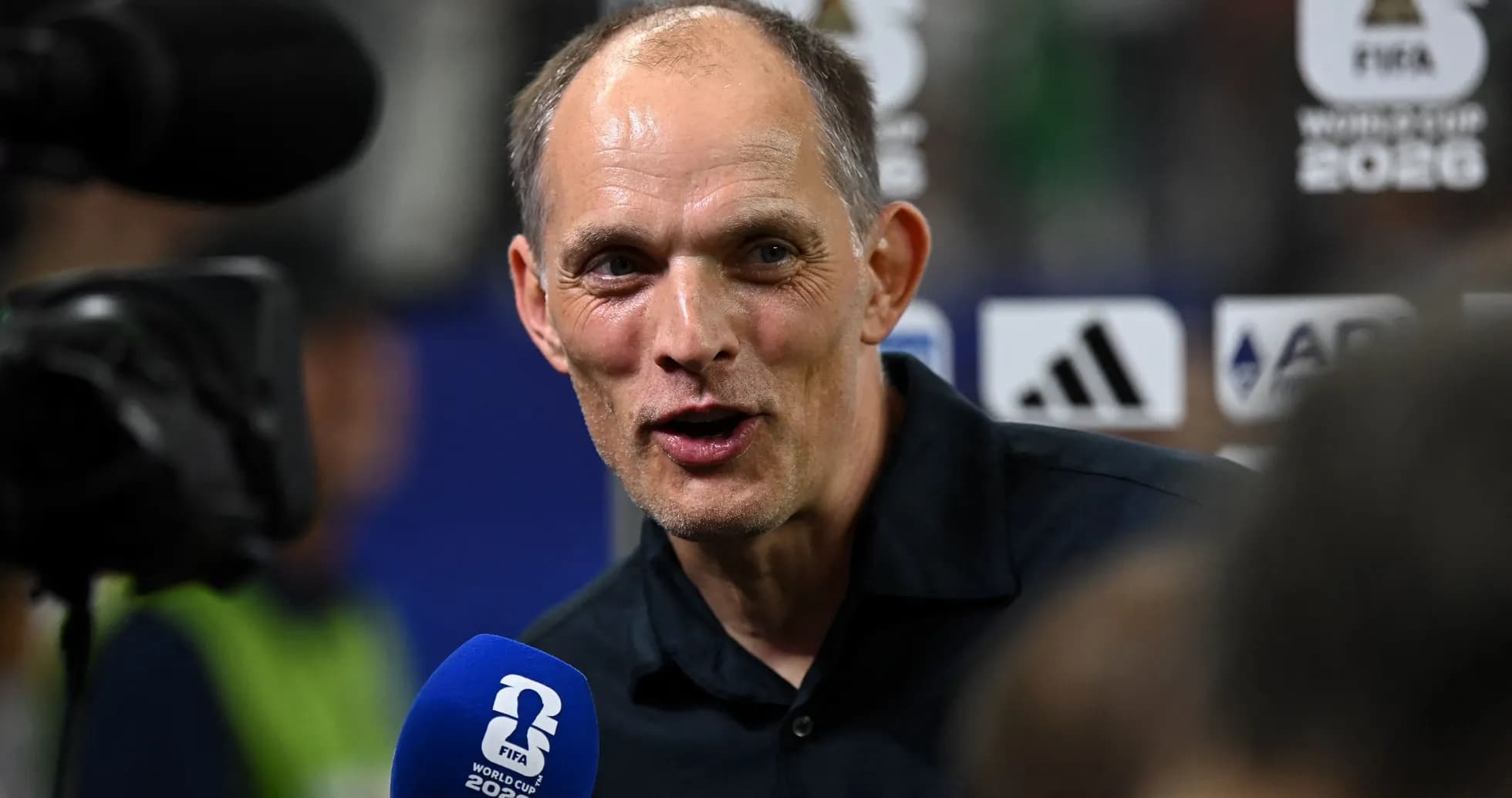 Coach speaking during press conference at FIFA World Cup