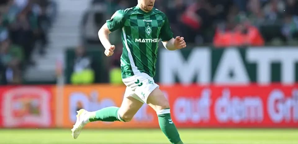 Player running with the ball on the field