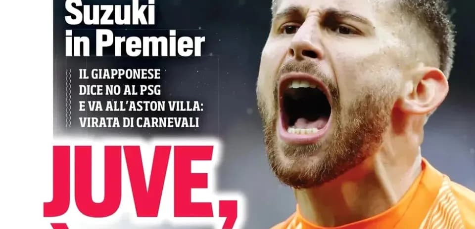 Goalkeeper shouting during a match in orange kit