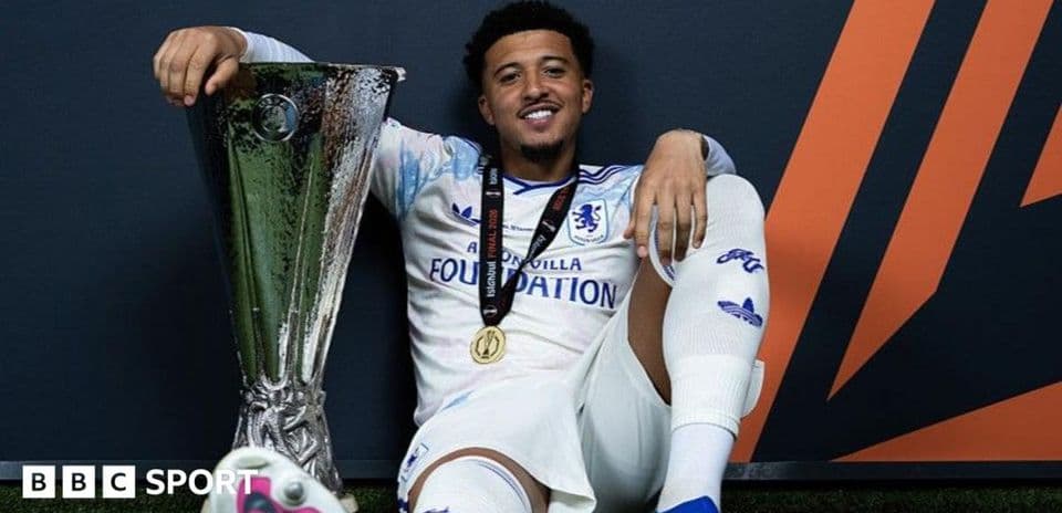 Player celebrating with trophy after winning competition
