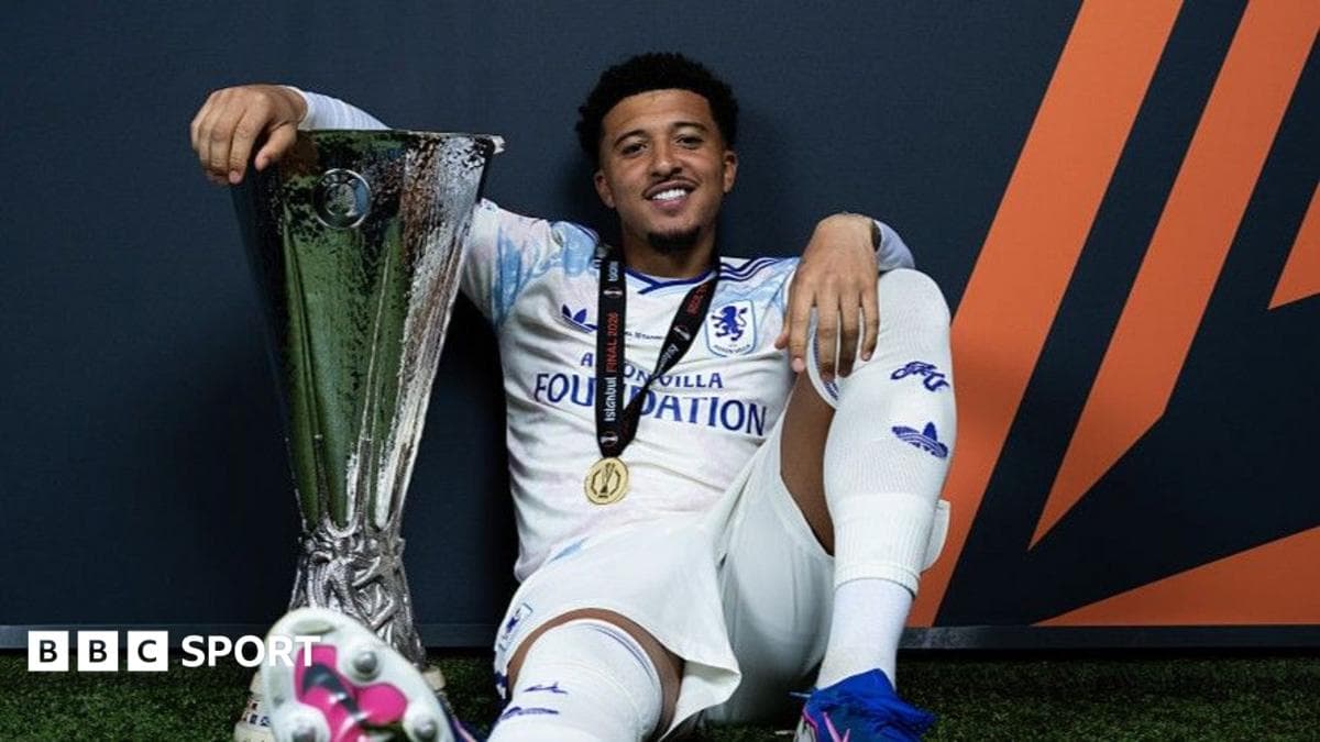 Player celebrating with trophy after winning competition