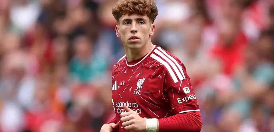 Player in Liverpool kit during match at stadium