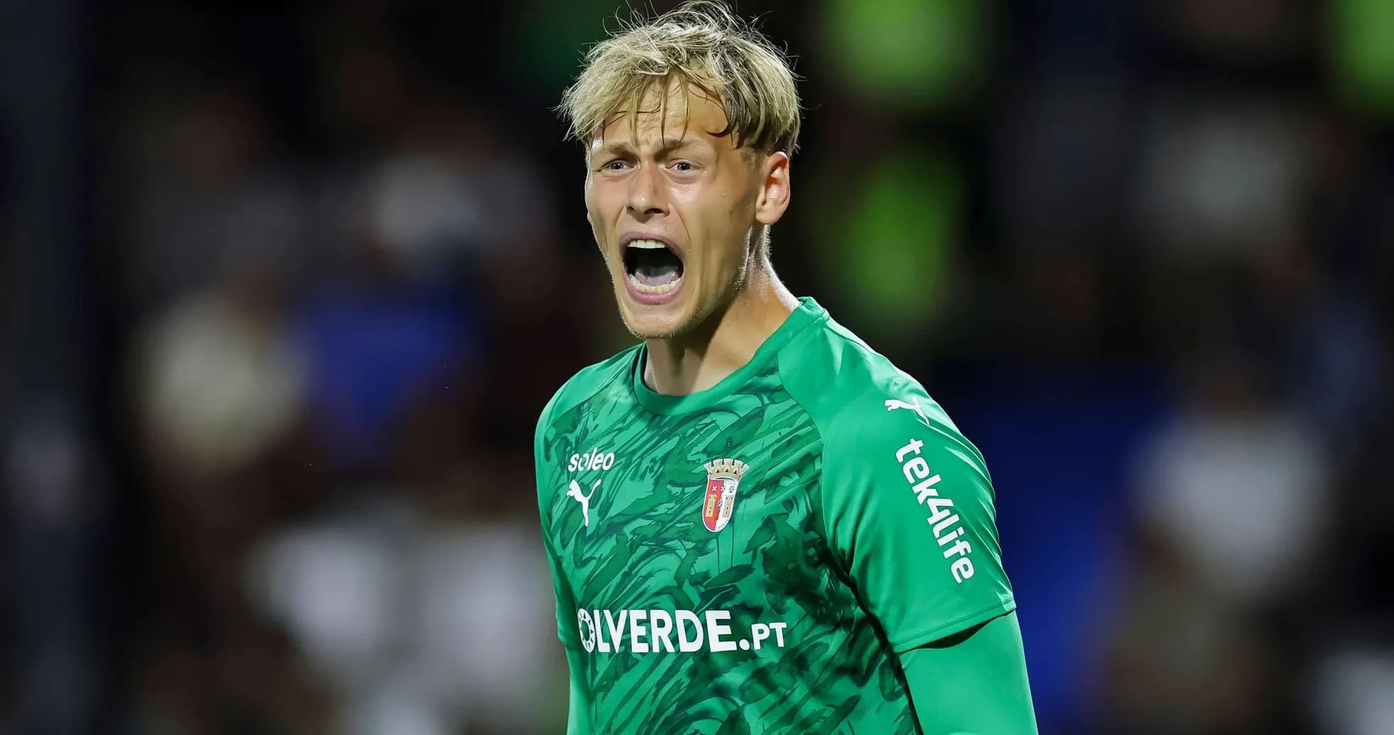 Goalkeeper yelling during a football match