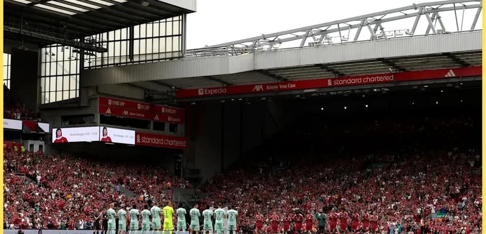 Teams lined up before match at Anfield stadium