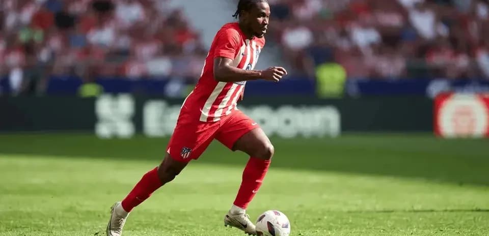 Player running with the ball during a match