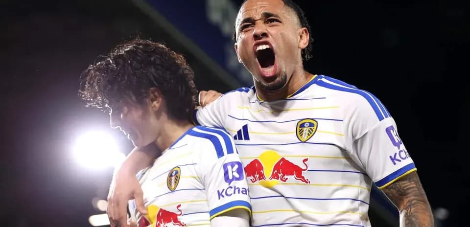 Leeds United players celebrating a goal together