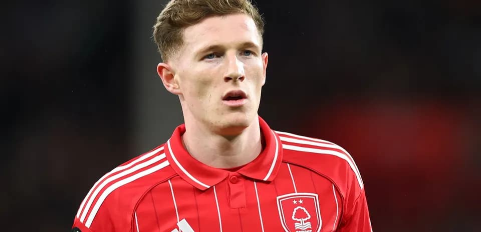 Player in red Nottingham Forest jersey during match